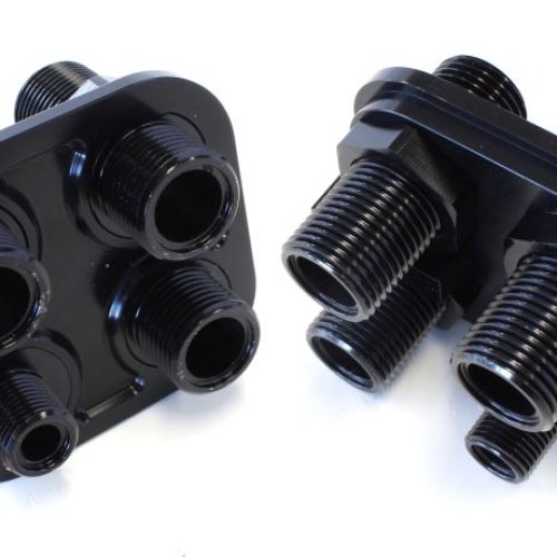 BLACK A/C BULKHEAD 4 PORT     3 X -10 / 1 X -6 THREADED PORT
