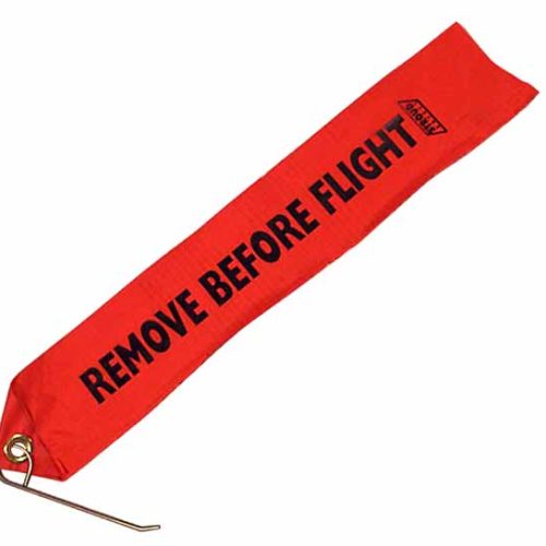 “REMOVE BEFORE FLIGHT” TAG WITH CHUTE LOCKING PIN. “RED”